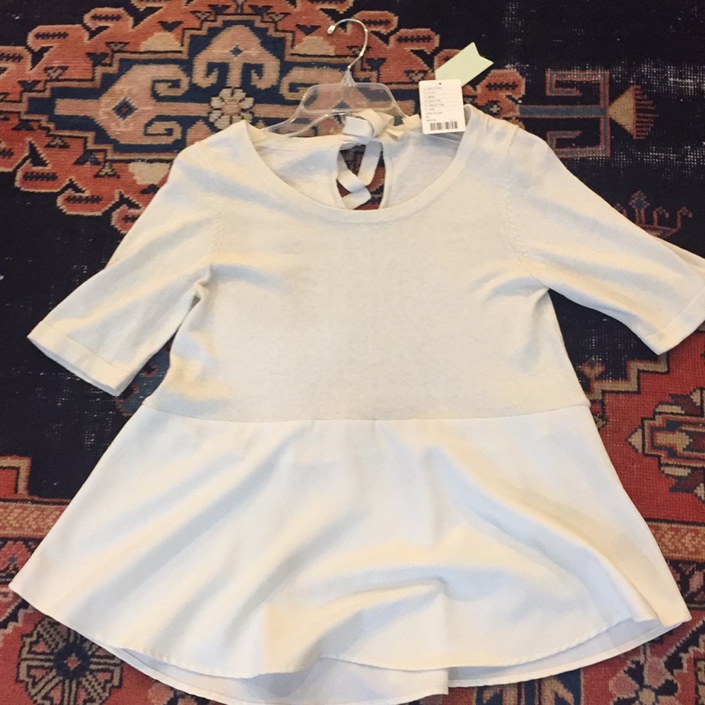Light sweater with silky peplum